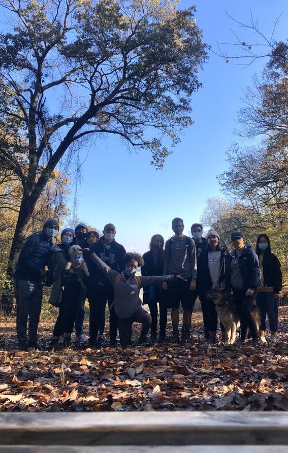 Photo of lab members in the woods.